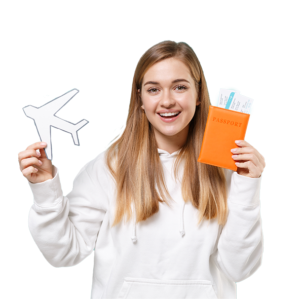 Smiling pretty young woman wearing a white sweatshirt holding a passport in one hand and paper plane in other hand, dreaming to going abroad.