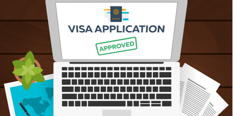 graphic illustration of a laptop displaying the approval of visa application