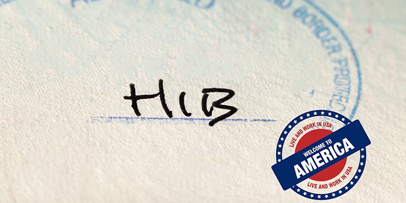 The Department of Homeland Security's H1B entry admission stamp. In the corner of the banner, there is a sticker that says, "Welcome to the America, work and live USA"