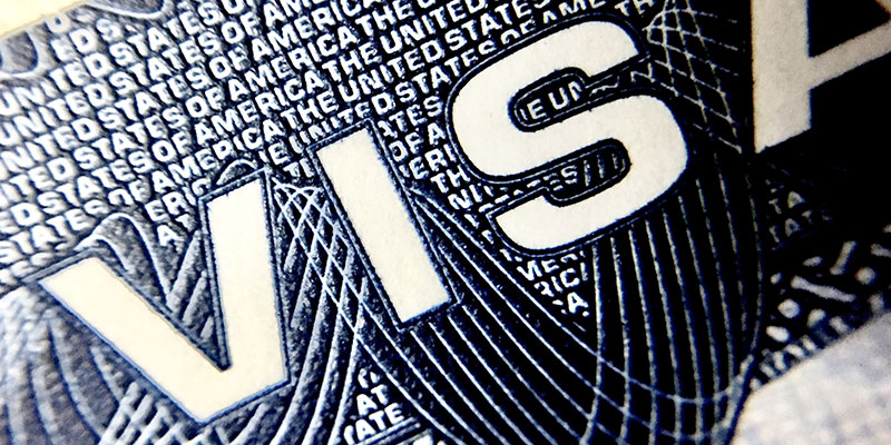 A magnified view of a visa page for the United States of America